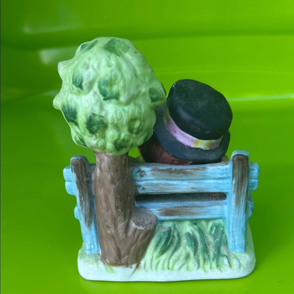 Charming Figurine with Sleeping Child and Cat